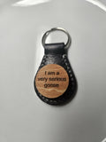 Round Leather Keychain With Wood Saying - Multiple Options