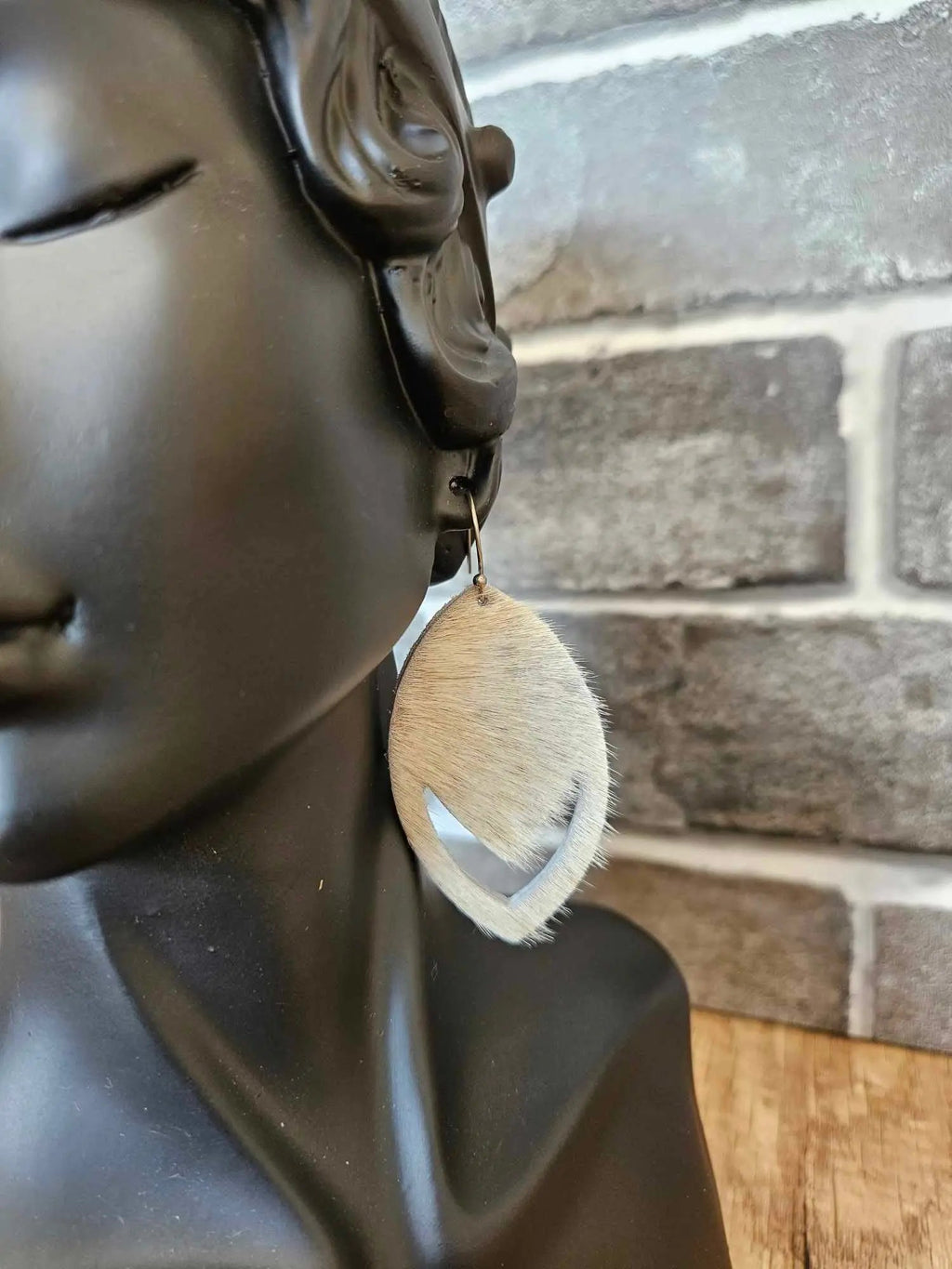 Hair-on-hide leather teardrop earrings with tan fur drop and loop hook
