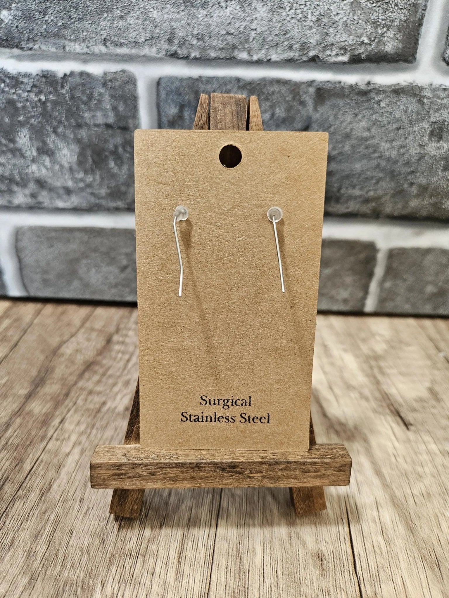 Surgical stainless steel earring hooks on display card