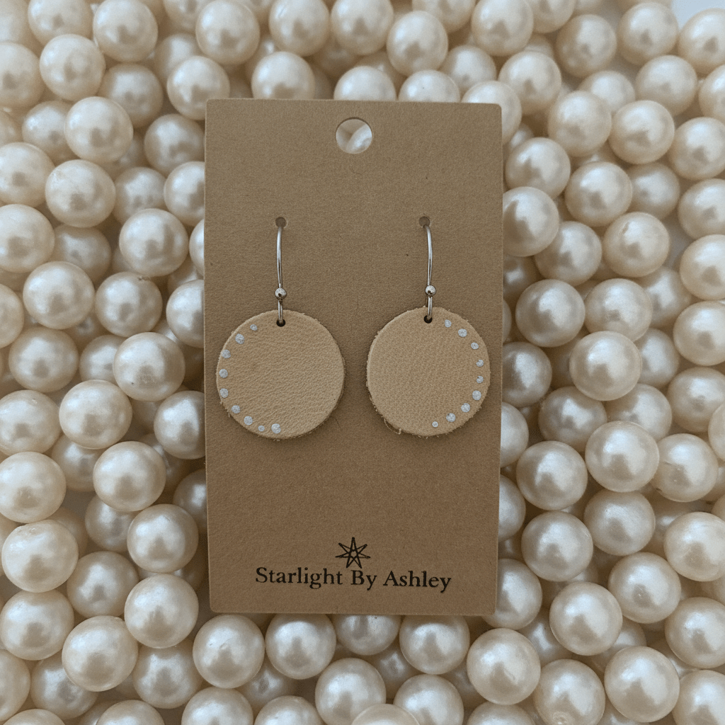 Beige leather round earrings with speckled edge, silver dangle hooks