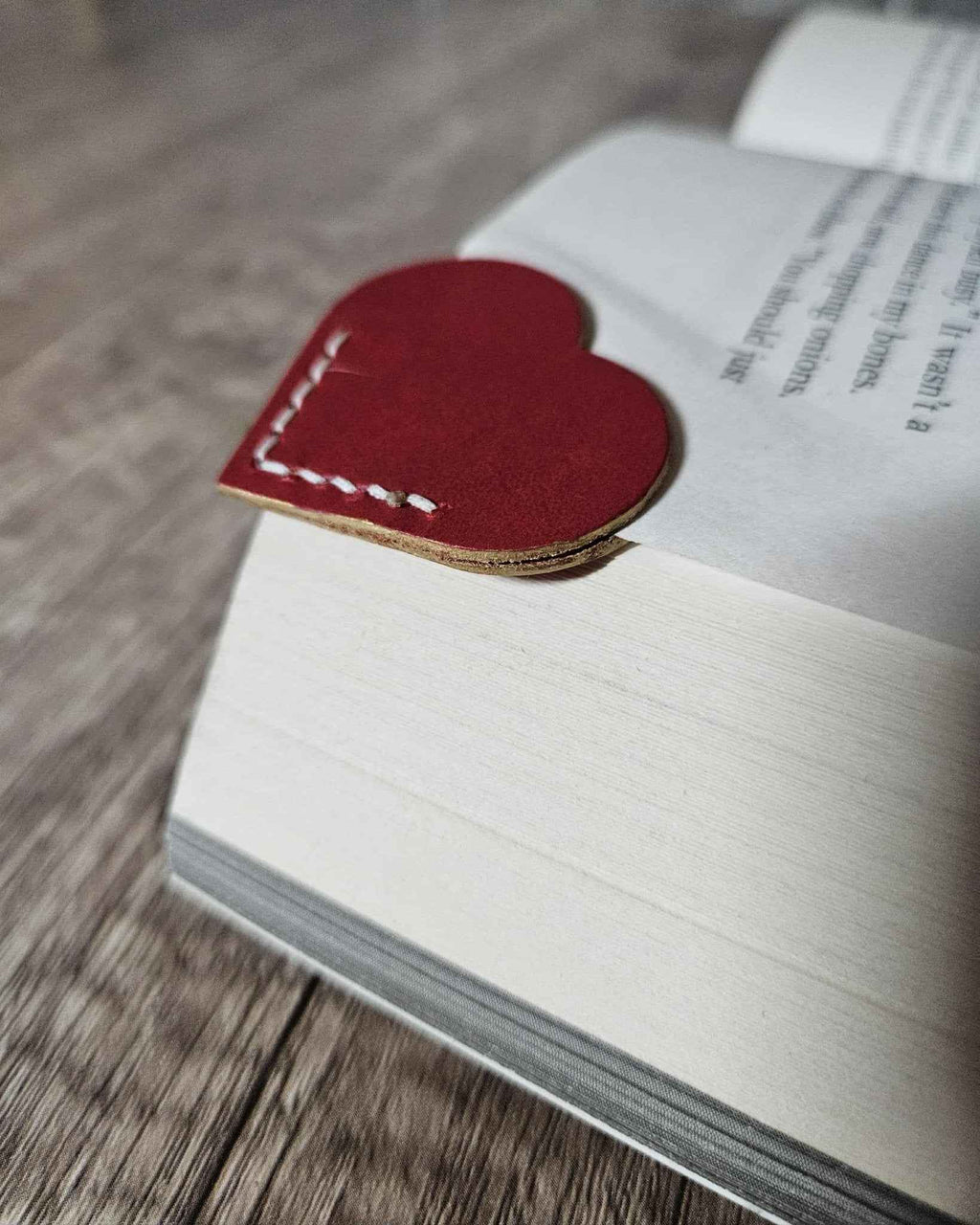 Red heart leather bookmark with corner stitching and metallic edge, page keeper