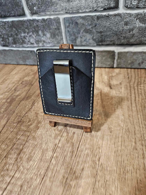 Black leather slim money clip wallet with visible metal money clip window