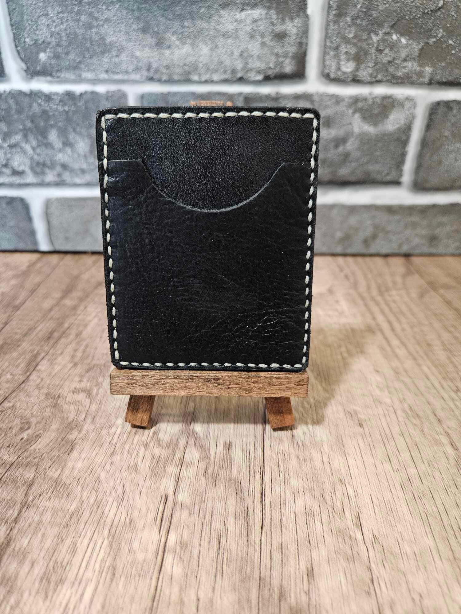 Black leather slim money clip wallet with stitched curved back panel