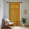 Mustard sheer window curtain panel with seven-point star geometric pattern and rod header