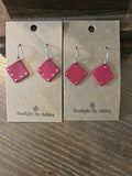 Red leather diamond earrings on display cards; silver hooks with small red diamond dangles