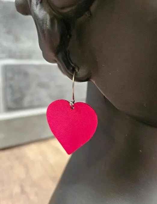 Red heart leather earring with gold-tone hook and a rounded dangling heart drop