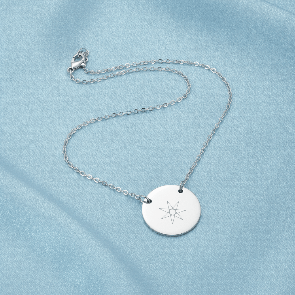 Silver-tone round disc pendant necklace with engraved star motif