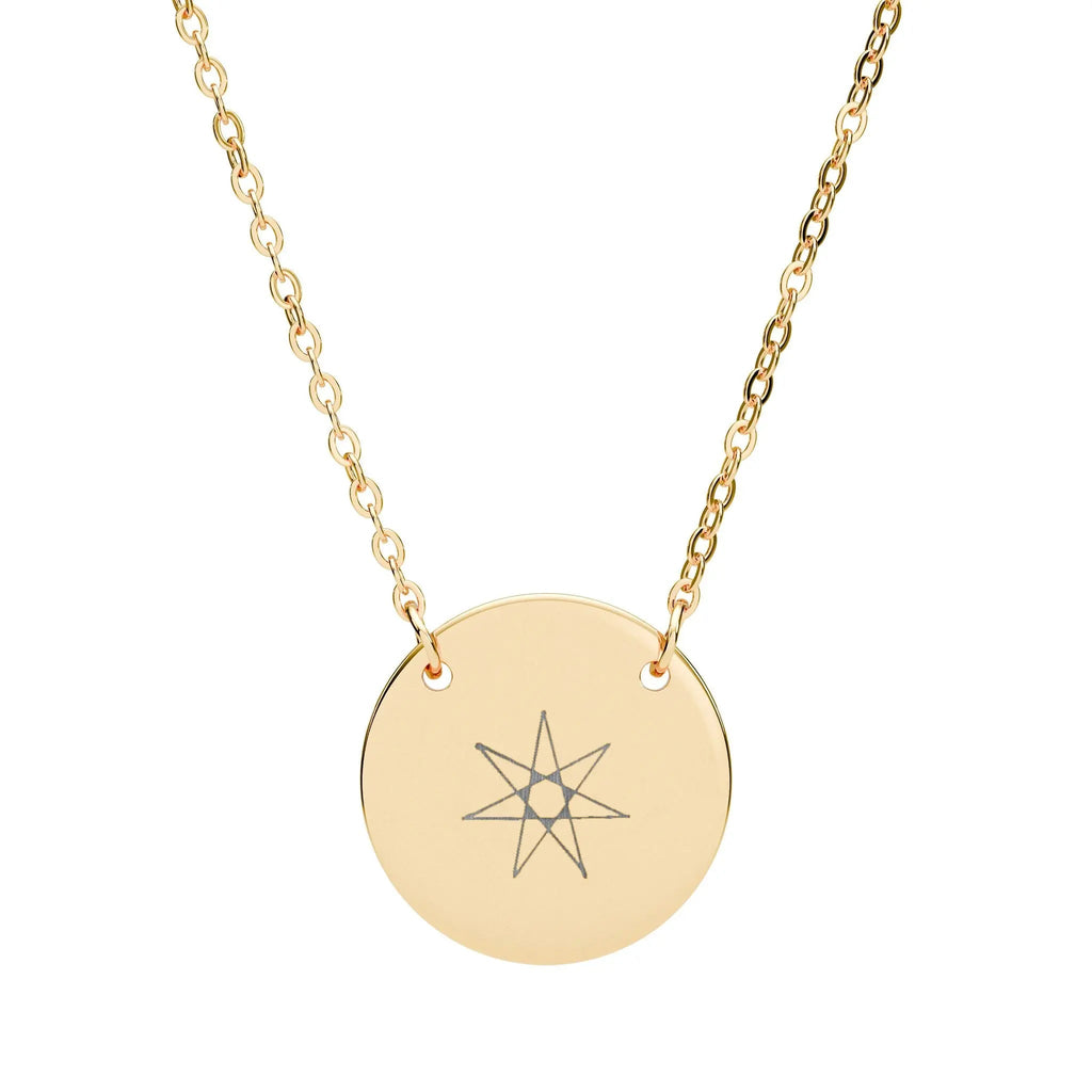 Gold-tone star circle pendant necklace with engraved seven-point star on round disc
