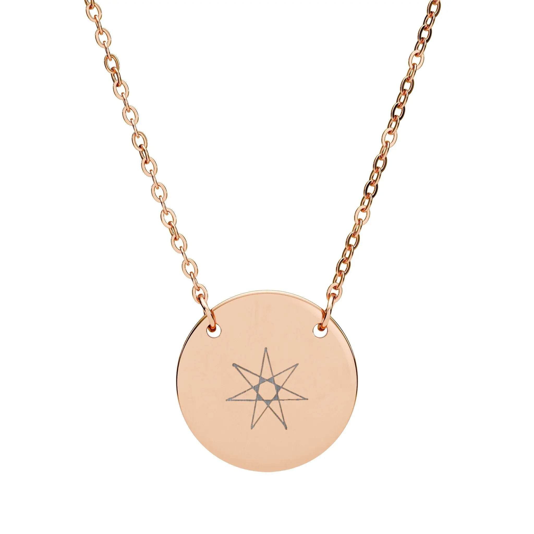 Rose gold-tone star circle pendant necklace with engraved seven-point star on round disc