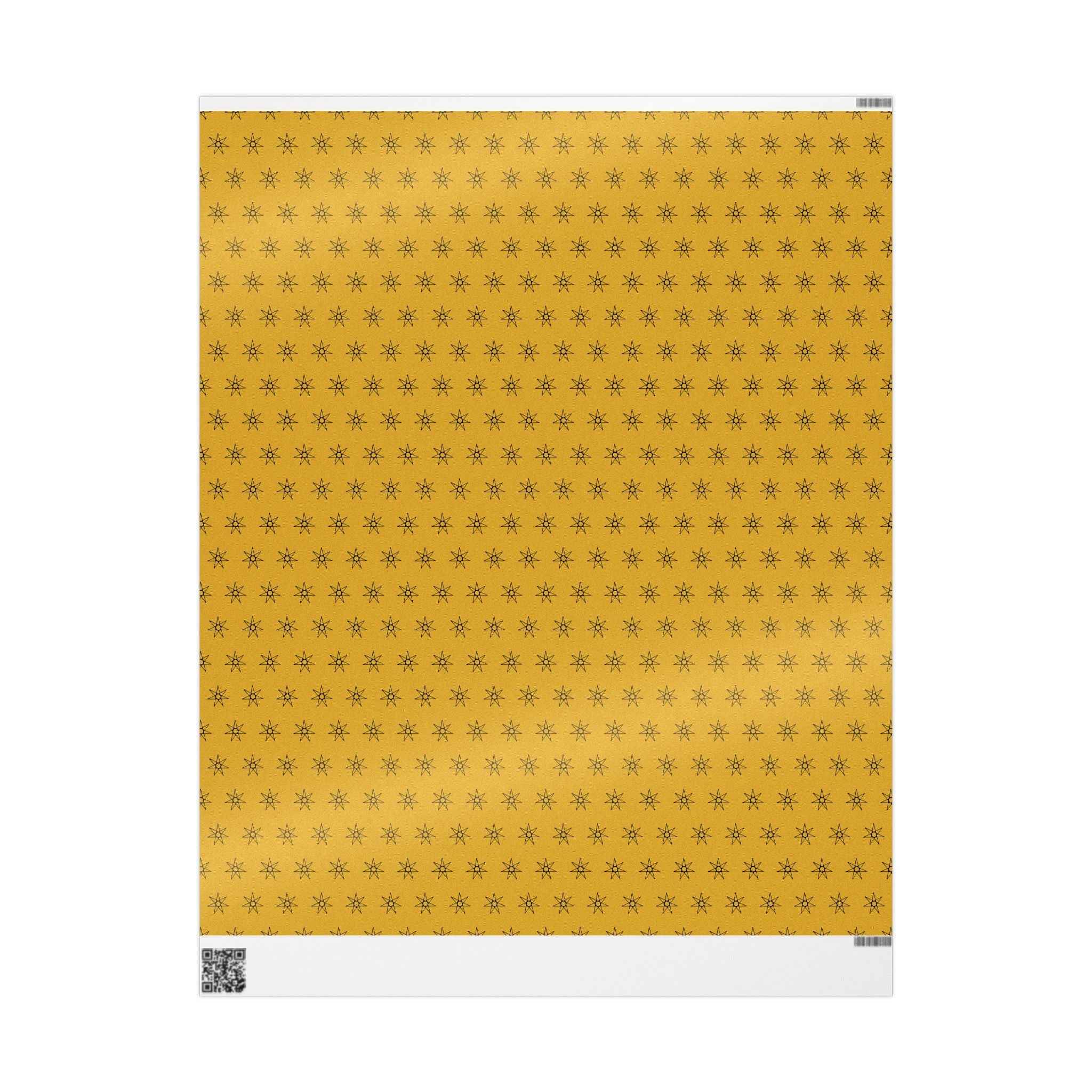 Yellow wrapping paper sheet with seven-point star pattern, front view on white background