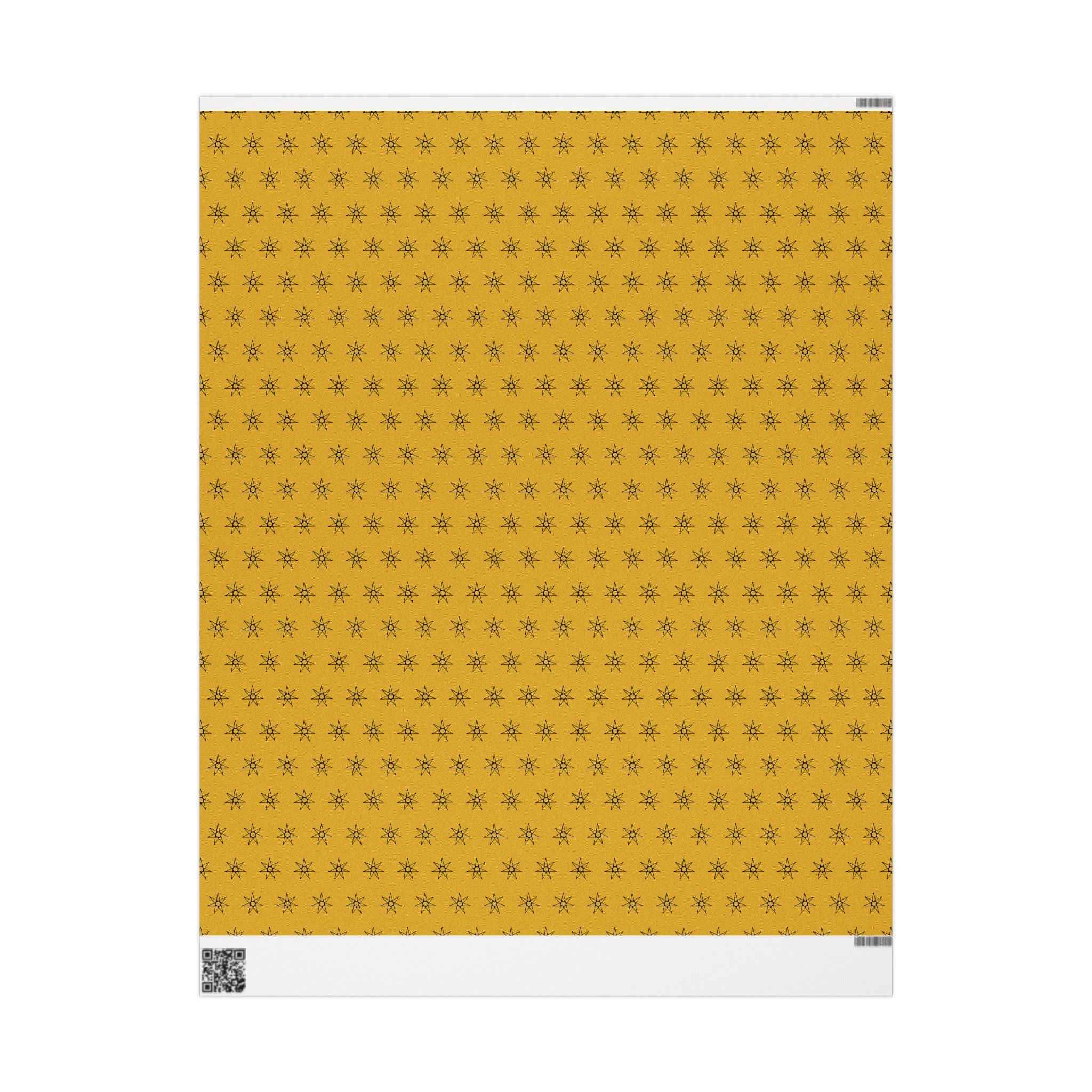 Yellow wrapping paper sheet with seven-point star pattern, vertical view